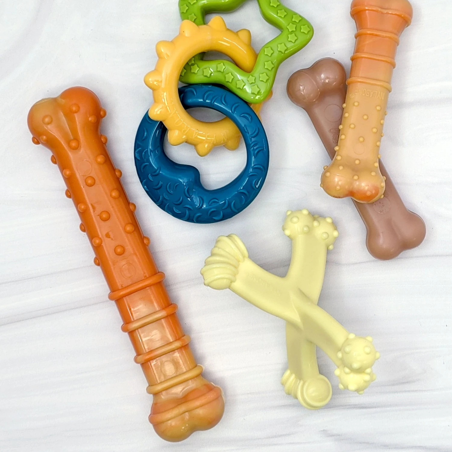 Nylabone Puppy Power Axis Bone Nylon Puppy Chew Toy Vanilla 10 Nylabone Puppy Power Axis Bone Nylon Puppy Chew Toy Vanilla - Image 8